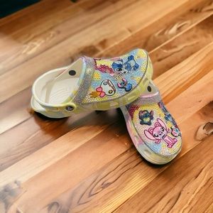 Slightly worn blinged out Crocs. These crocs are a size women 10 and men 8